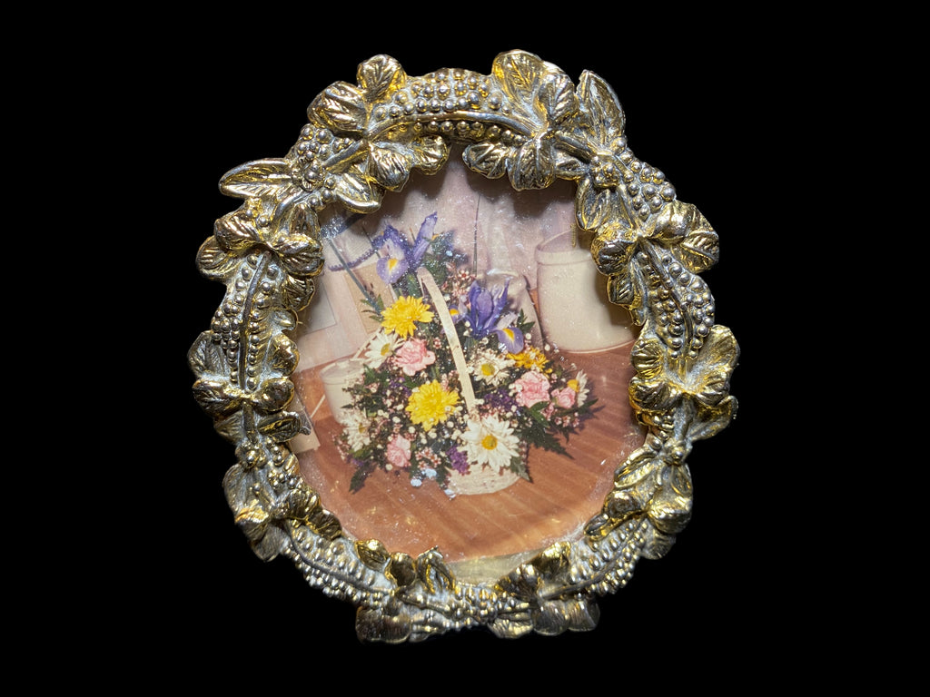 Hauntingly beautiful vanity item, floral picture